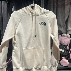 The North Face Cream Hoodie with Black Logo